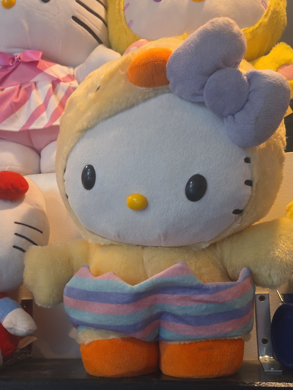 Sanrio Hello Kitty Yellow Plush with Purple Bow and Orange Feet